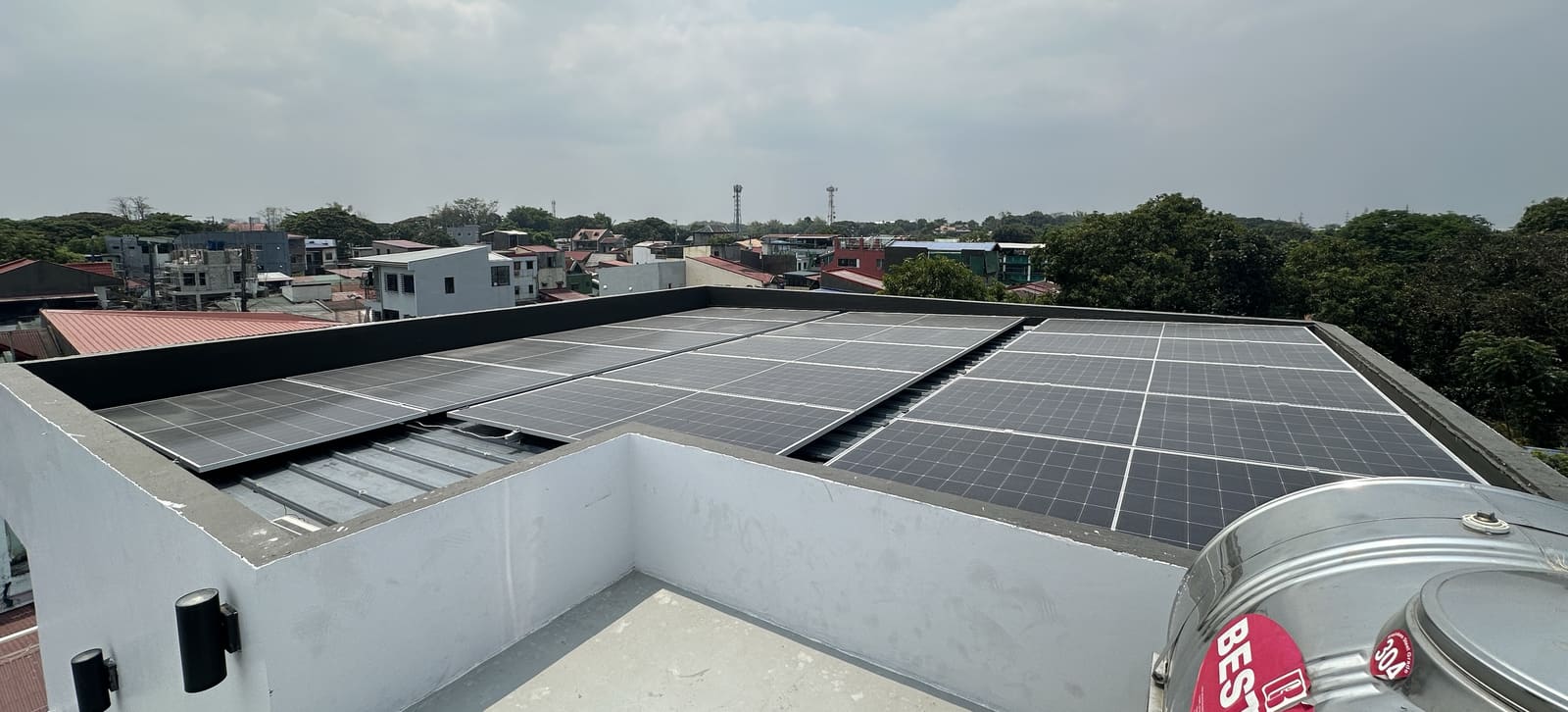 Hybrid solar panel system installed on a residential rooftop in Bulacan